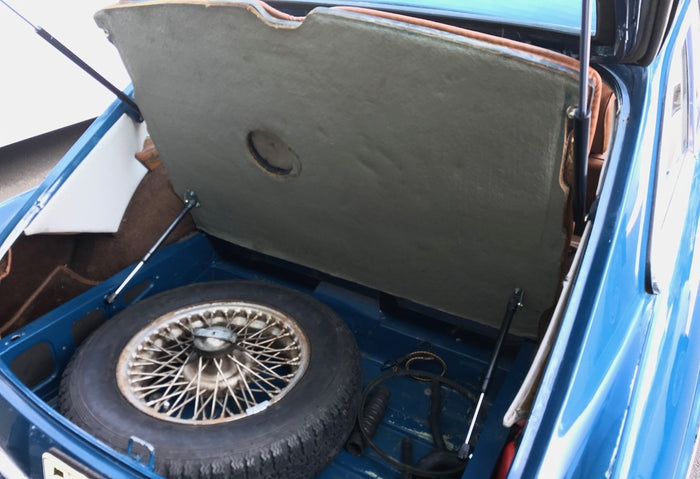Installing an MGB GT spare tire well strut kit